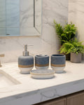 4-piece ceramic bathroom accessory set with soap dispenser, toothbrush holder, tumbler, and vanity tray for modern bathroom decor.