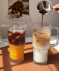 750ML premium glass tumbler with ergonomic handle, leak-proof lid, reusable straw, and durable glass design for coffee, tea, juice, smoothies, and water.