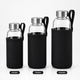 Borosilicate glass water bottle with black silicone cover - front view