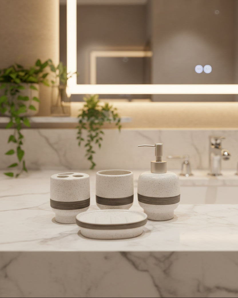 4-piece ceramic bathroom accessory set with soap dispenser, toothbrush holder, tumbler, and vanity tray for modern bathroom decor.