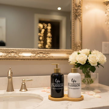 Luxury glass soap and lotion dispenser set with bamboo tray for modern bathroom and kitchen countertop organization.