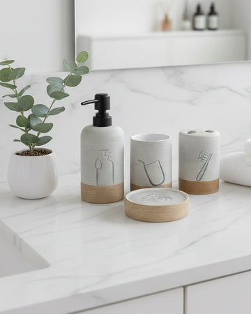 Modern ceramic 4-piece bathroom accessory set with soap dispenser, toothbrush holder, tumbler, and vanity tray for stylish bathroom organization.