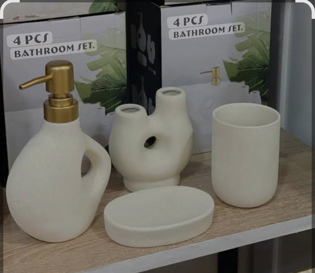Luxury Nordic ceramic bathroom accessory set with matching soap dispenser, tumbler, toothbrush holder, and organizer tray.