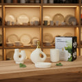 Luxury Nordic ceramic bathroom accessory set with matching soap dispenser, tumbler, toothbrush holder, and organizer tray.