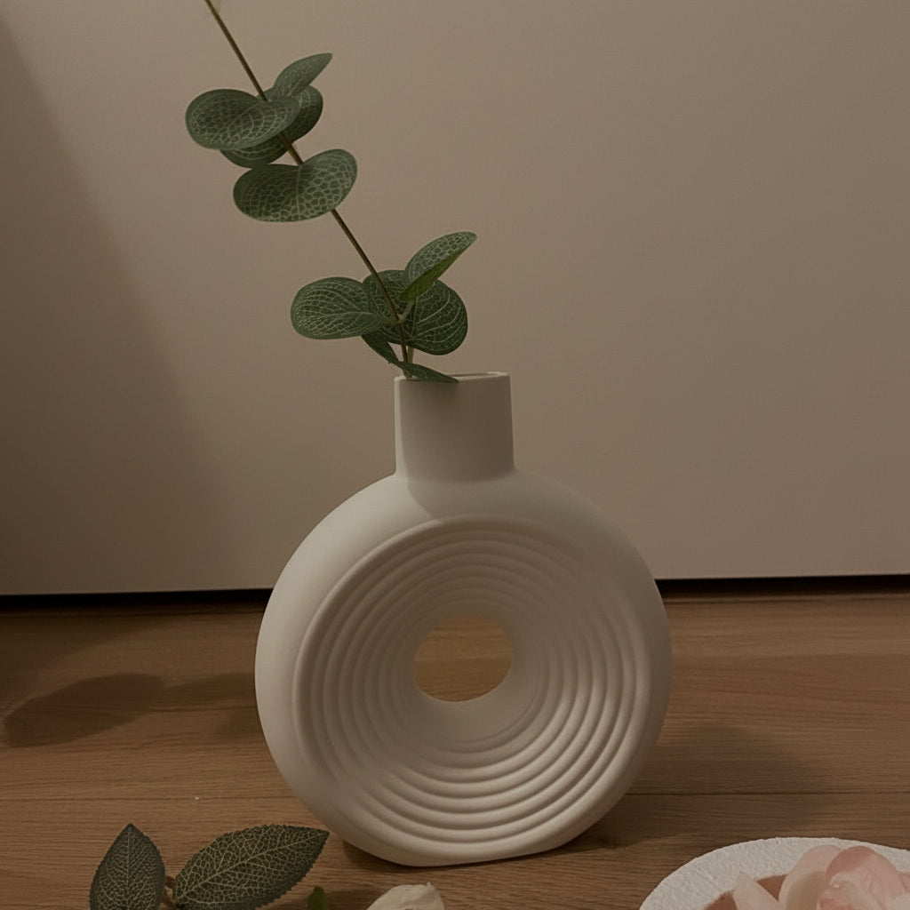 Modern ribbed ceramic donut vase in matte white